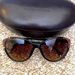 Black cat eye sunglasses with brown leather snake skin detailing